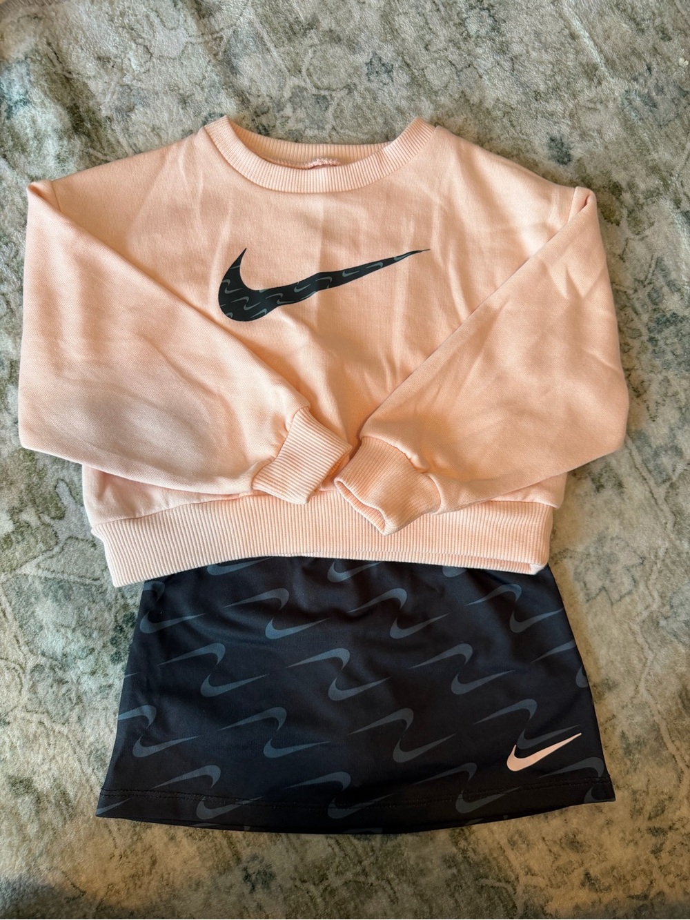 Nike Peach Crewneck Sweatshirt with Black Swoosh + Black Patterned Skirt